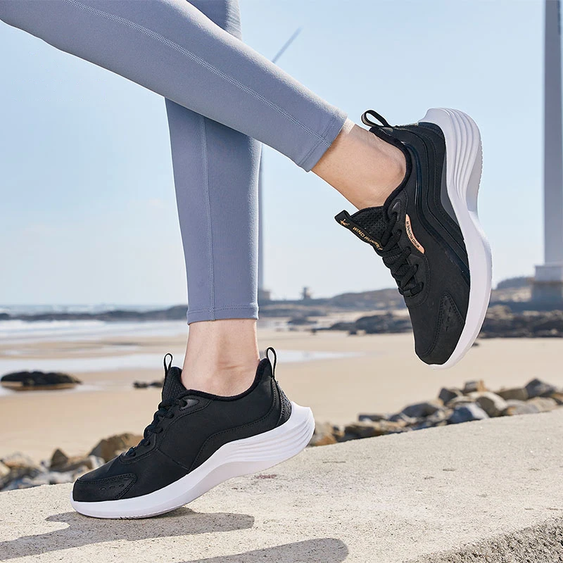 QIAODAN Lightweight Running Shoes for Women Winter Women's Casual Black Leather Waterproof Soft-soled Sneakers XM46210219