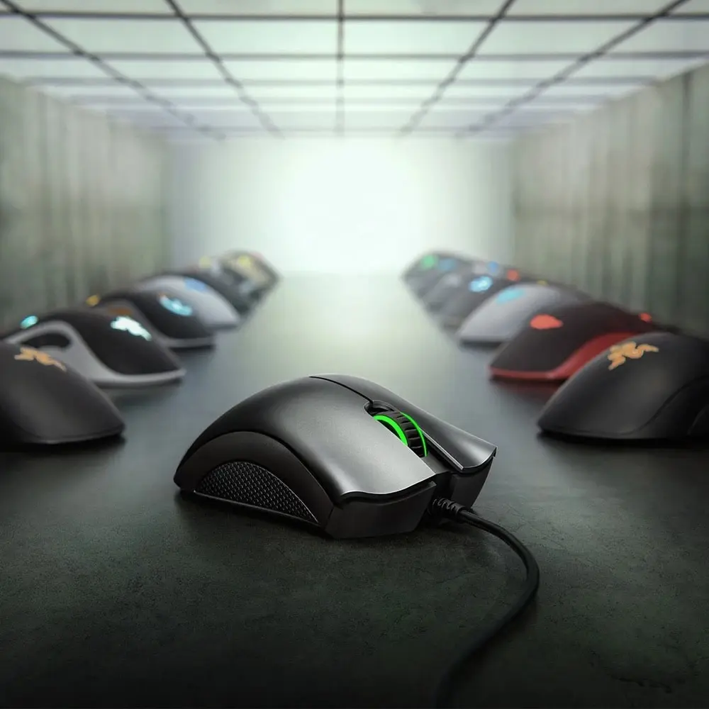 Sleek Black Wired Gaming Mouse with 6400 DPI Optical Sensor and 5 Customizable Buttons