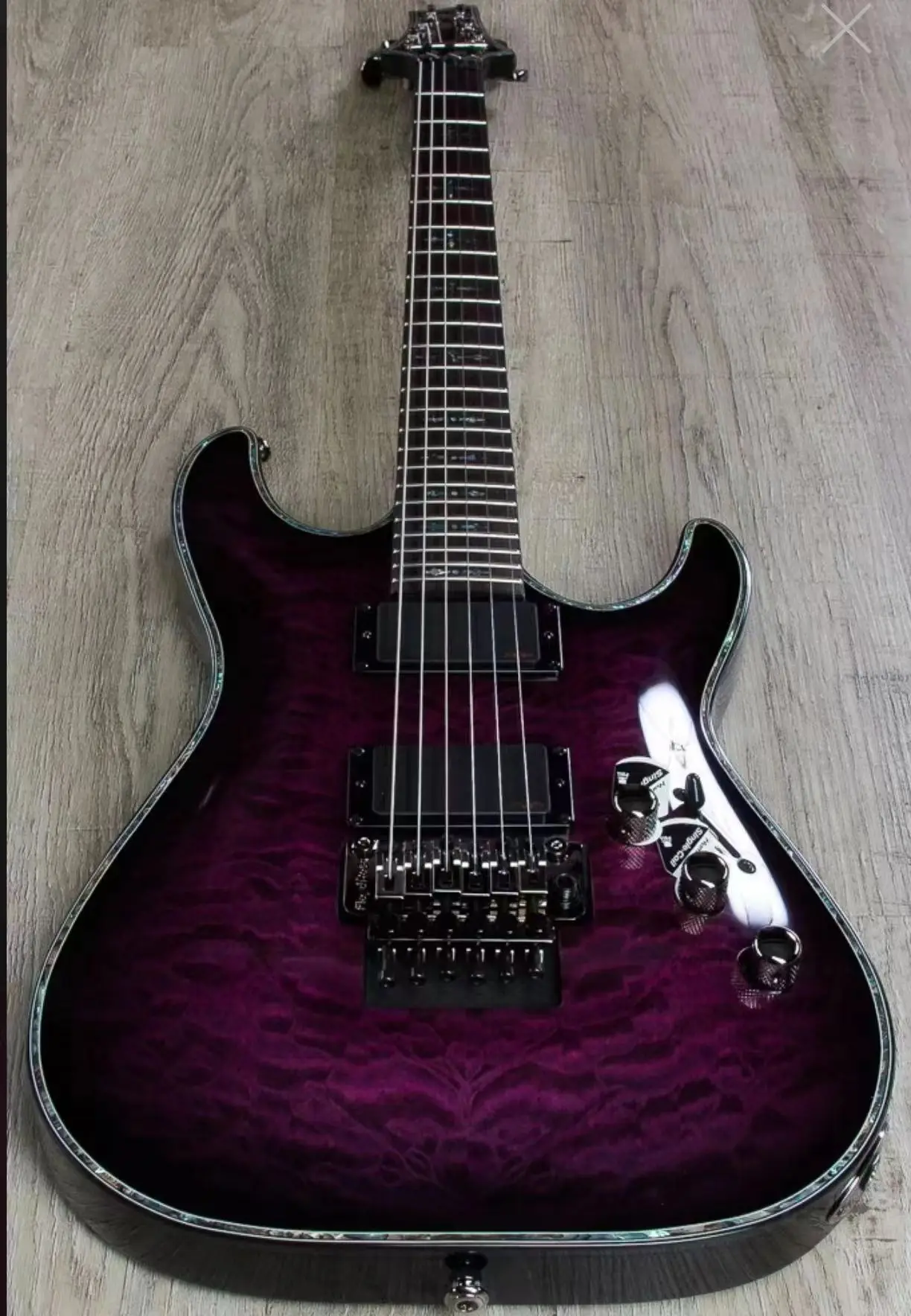 6-string electric guitar, rosewood fingerboard, tremolo bridge, EMG active pickup