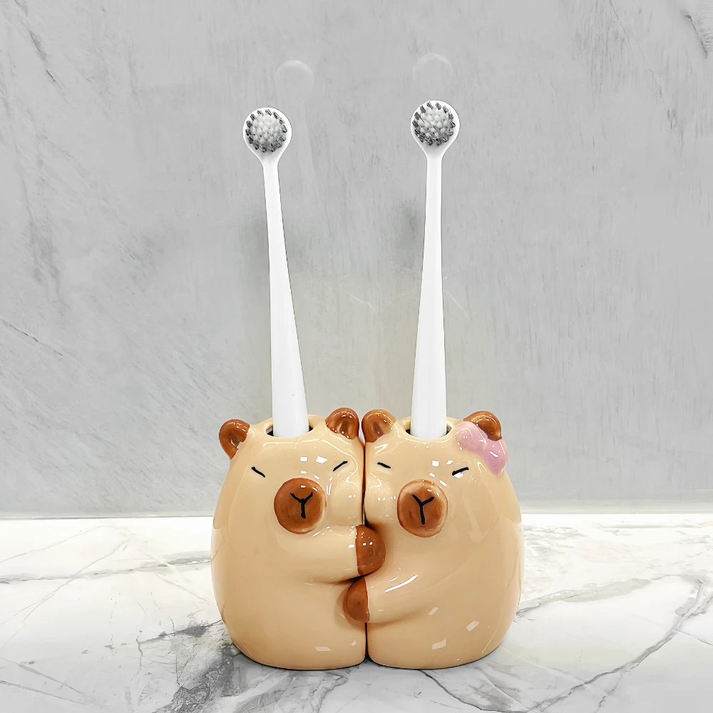 A cute Capibala manual toothbrush storage base bracket suitable for fashionable couples bathroom ceramic bow toothbrush holder