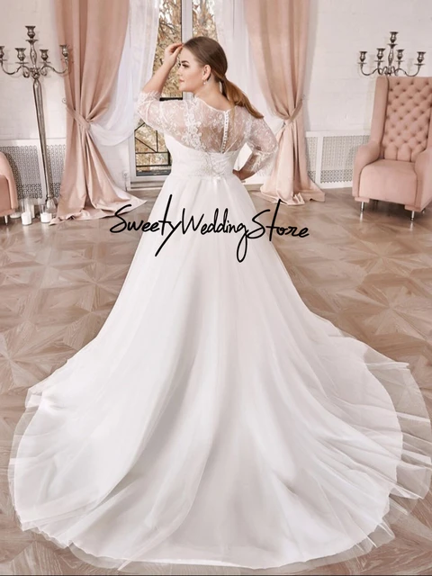 Soft tulle and applique lace wedding gown