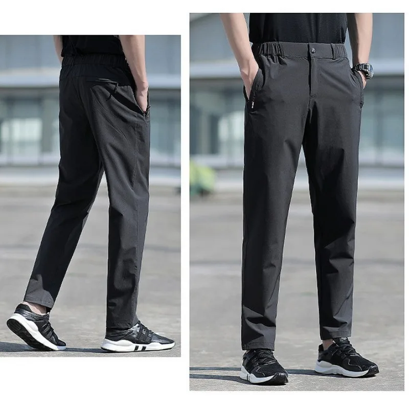 2023 Summer New Large Size Men Pants Big Size Ice Silk Stretch Breathable Straight Leg Pants Quick Dry loose long Trousers