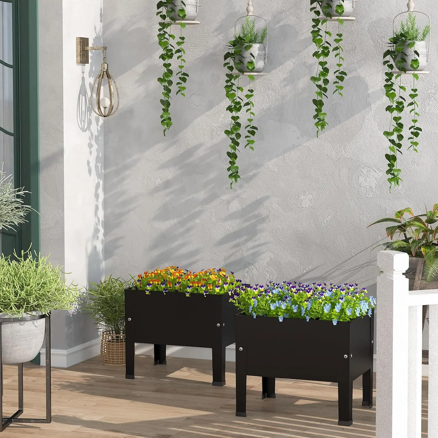 Herbs planted in raised metal garden box