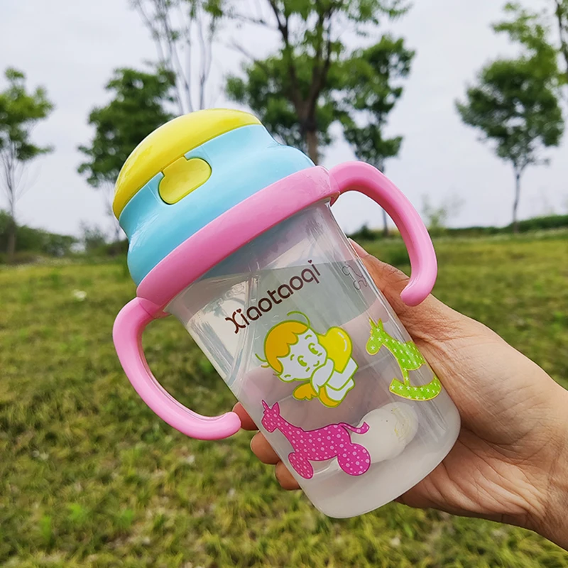 https://ae01.alicdn.com/kf/S192fb47a2a1040e88302c4c213028706E/Baby-Feeding-Sippy-Bottle-Portable-Children-Cute-Water-Bottle-with-Shoulder-Strap-Cute-Print-Kids-Training.jpg