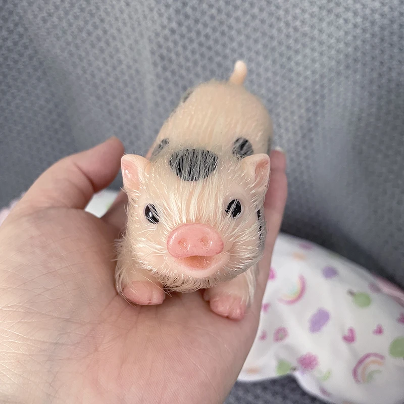 https://ae01.alicdn.com/kf/S193854c19f984cc08ea9ec99880a41d9b/5-Inches-Soft-Silicone-Newborn-Pig-Doll-Lifelike-Pig-Baby-Kids-Toys-Photography-Props.jpg