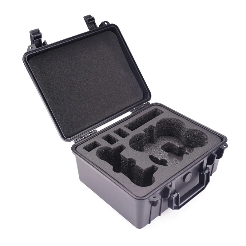 Étui ouvert montrant le drone DJI Neo et ses accessoires rangés dans la mousse sur mesure, avec le couvercle relevé.