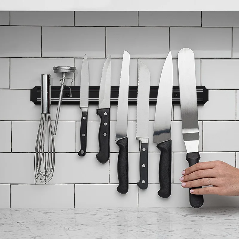 https://ae01.alicdn.com/kf/S194f773af2744d5ca743f7aa67619e4f0/Free-Installation-Magnetic-Knife-Holder-Wall-Mount-Black-ABS-Plastic-Block-Storage-Holder-Chef-Rack-Strip.jpg