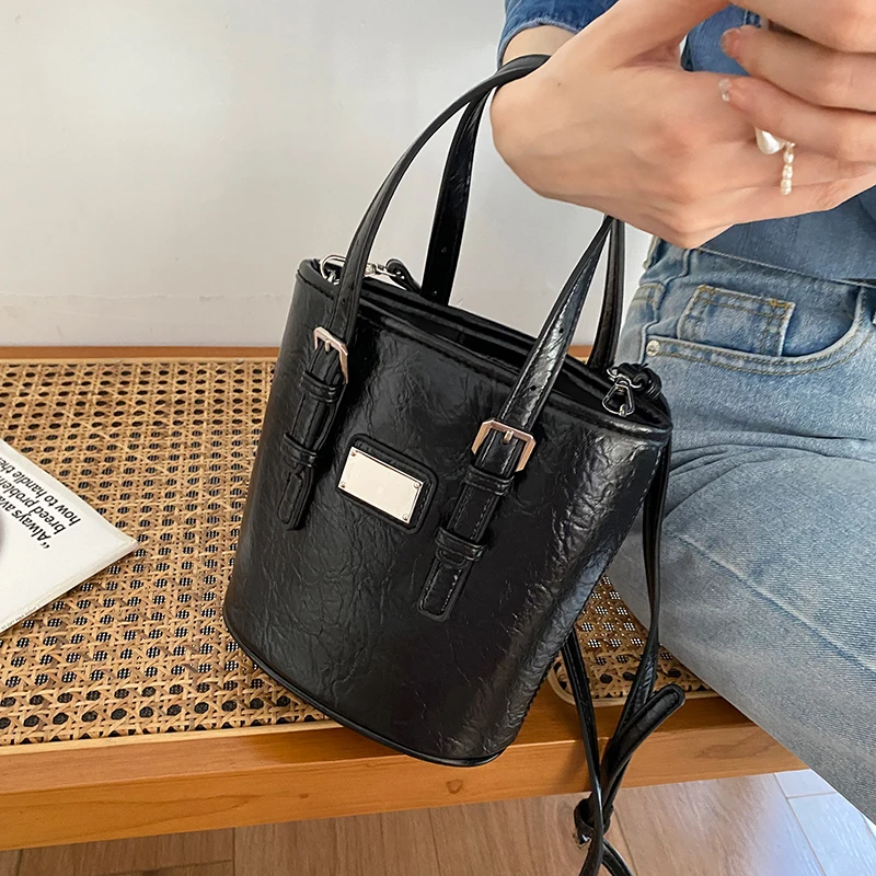 

Korean Retro Handheld Bucket Bag For Women Trendy High-end Casual Commuting Crossbody Bags Female Versatile Student School Pack