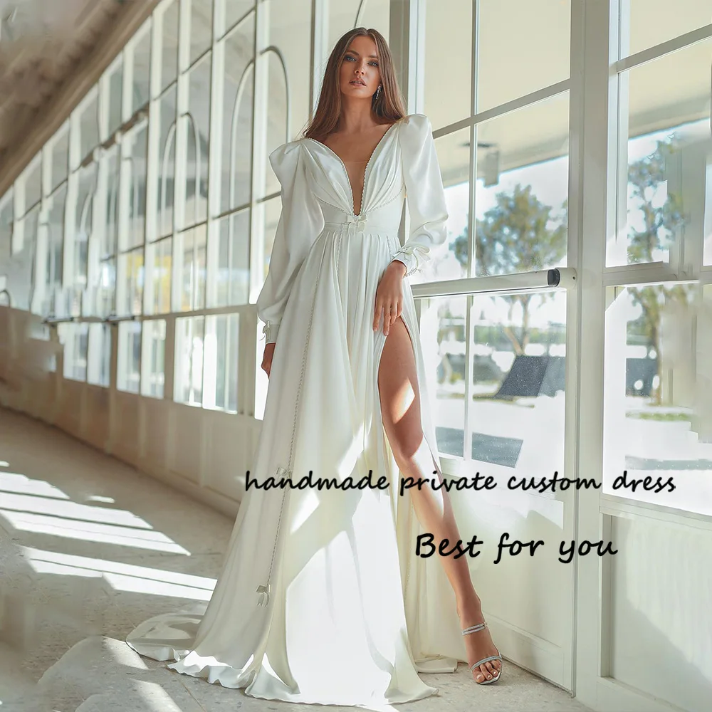 

White A Line Wedding Dresses with Slit Long Sleeve V Neck Pleats Satin Bride Dress with Train Beach Wedding Gowns
