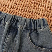 High Waist Jeans mit Sternen – Bild 5