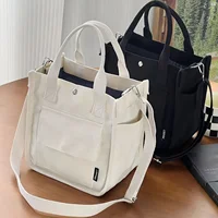 Compact Canvas Tote Bag - Strong  Closure, Stylish Multi-Pocket Crossbody, Handy Lunch Organizer, Versatile for Work & Casual -  1