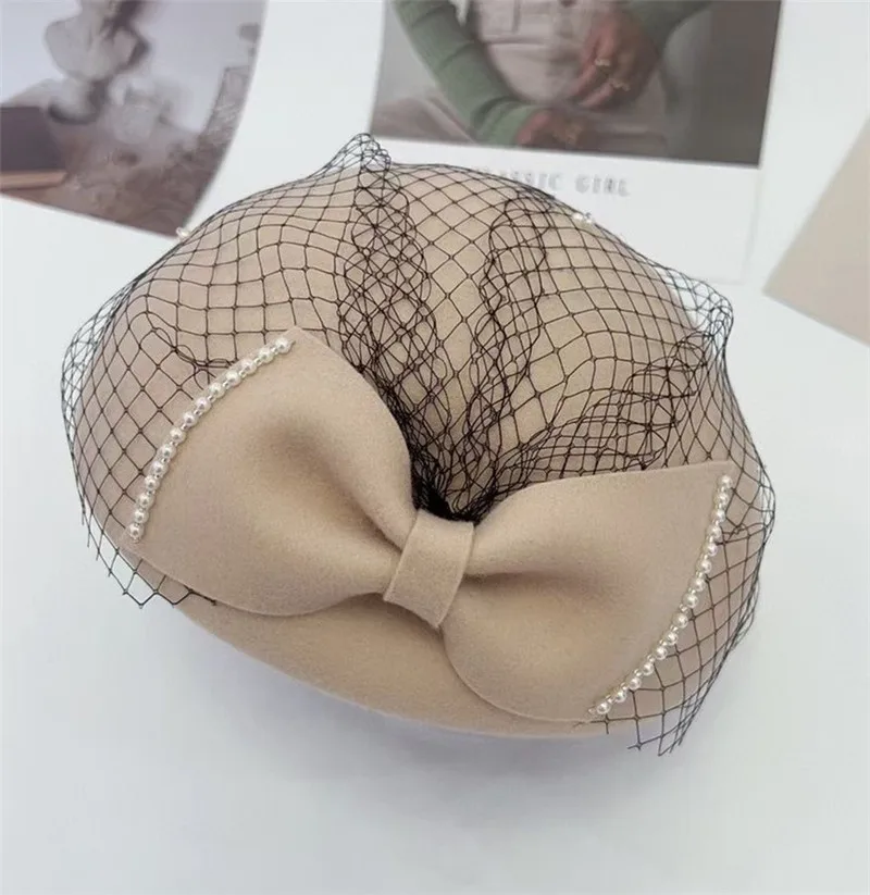 

202312-2509263 ins chic winter wool felt pearl bowknot mesh grace lady beret cap women Leisure painter hat