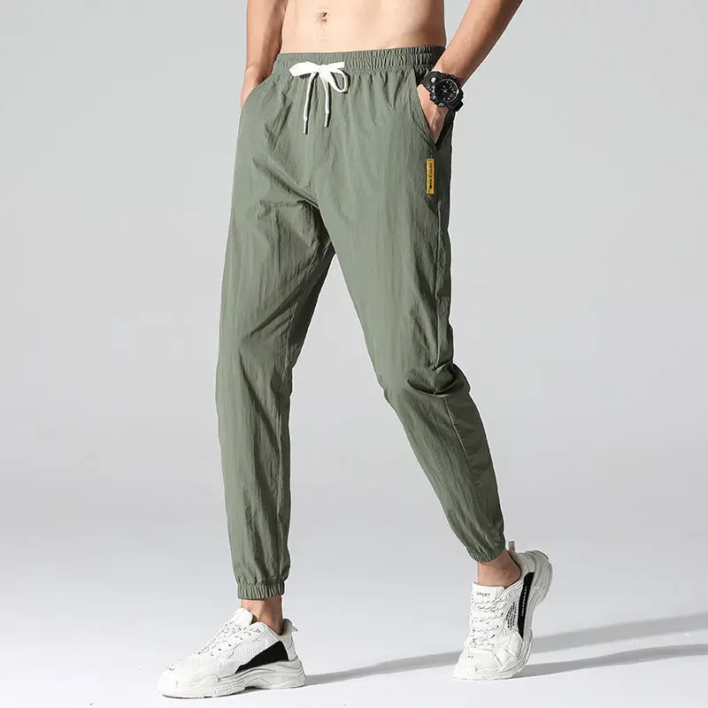 joggers sweatpants Nine-point pants men's summer thin ice silk casual men's trend loose-fitting sports pants Korean pants men's quick-drying mens harem joggers Harem Pants