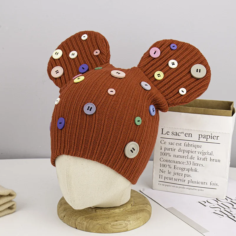 

Color Button Big Ear Knitted Hats Autumn and Winter Warm Pullover Cap Men Cartoon Wool Hat Wholesale Bonnets for Women