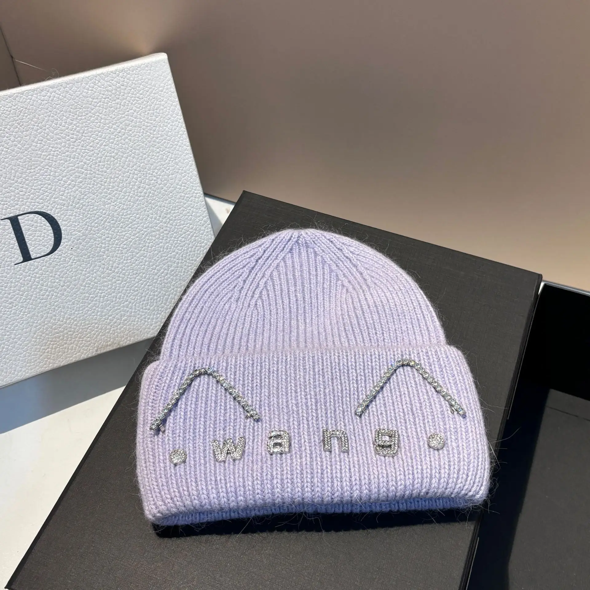 Inverno nuove lettere Wang orecchie di gatto carino pelliccia di coniglio cappello lavorato a maglia berretto caldo addensato all'aperto femminile
_voghion.com