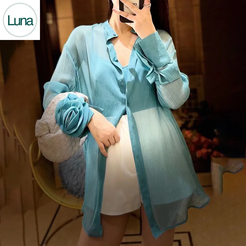 

European and American new temperament fashion thin chiffon shirt women's design sense loose two-penetrating sexy cardigan shirt