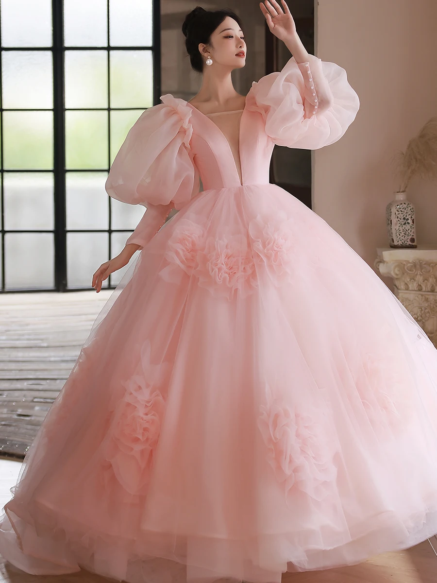 Beautiful Blonde Women in Pink Evening Gown Smiling. Perfect Hairstyle,  Makeup and Summer Flowers Stock Photo - Alamy