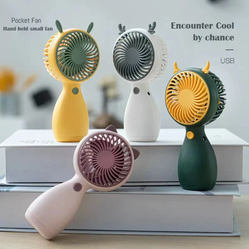 

Cartoon Handheld Fan Portable Mini Built-in noise reduction and shock absorption function USB Super Long Range Rechargeable Ran