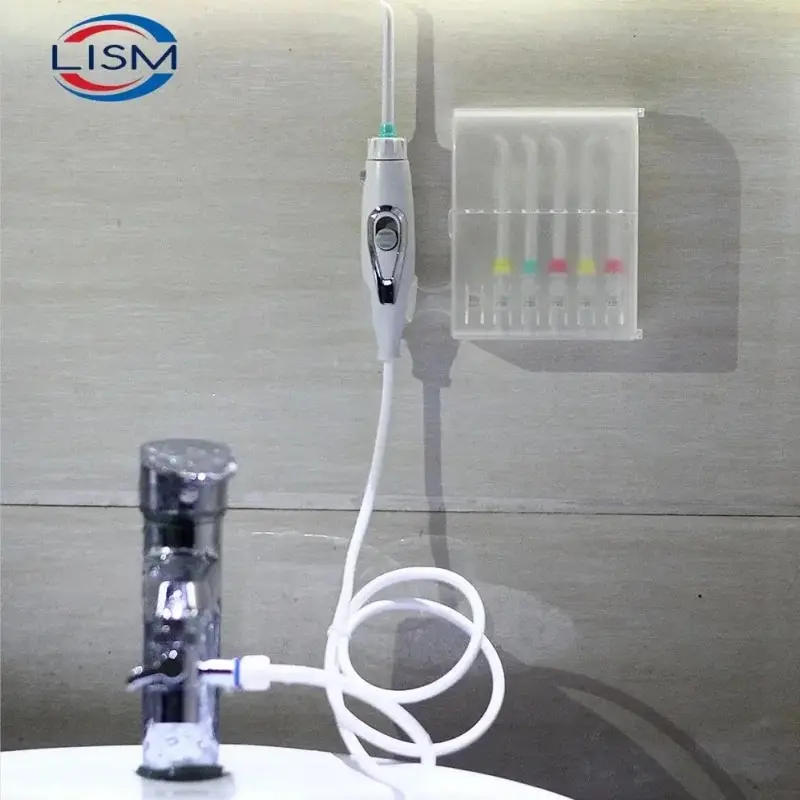 Oral irrigator for cleaning teeth flosser