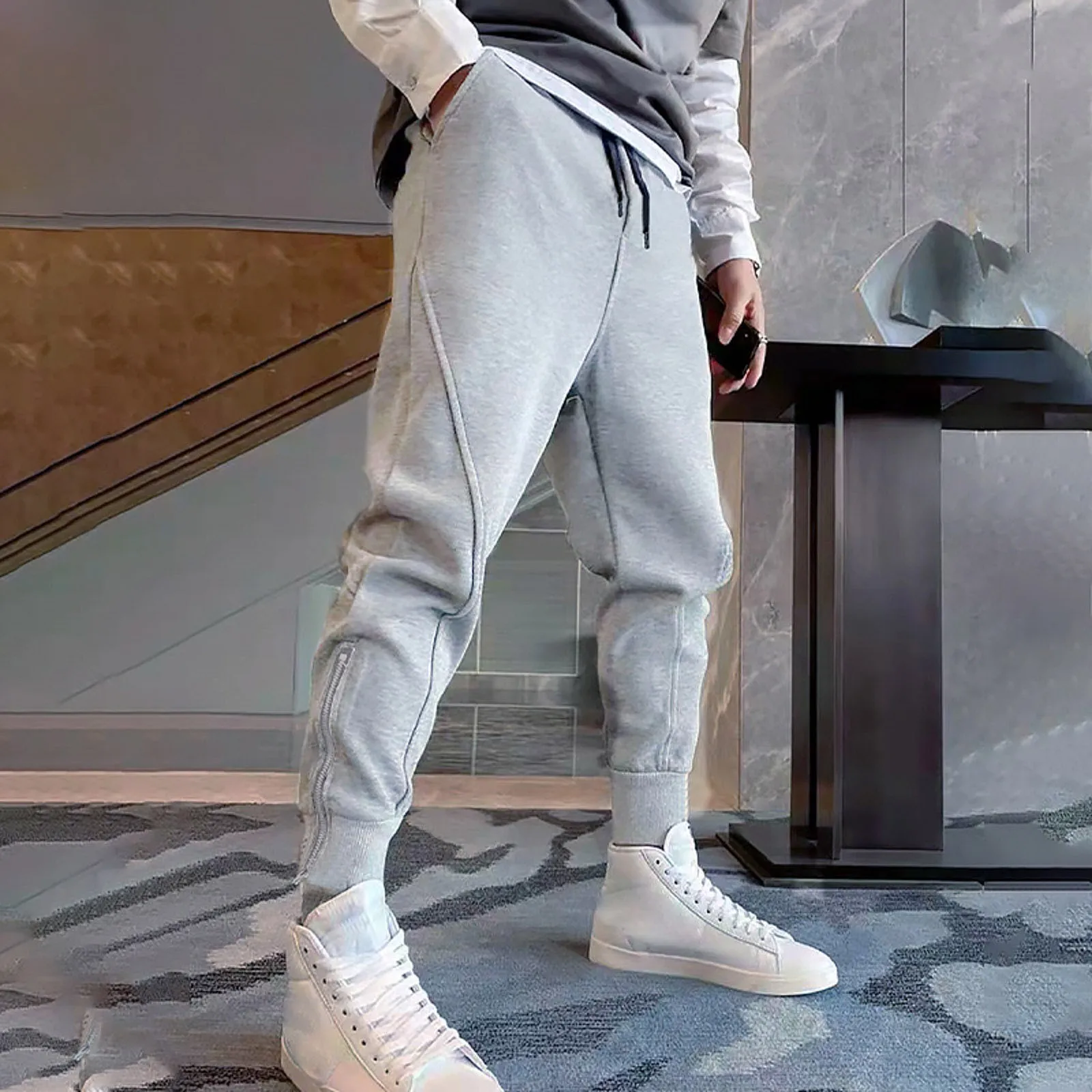 

2023 New Mens Casual Sports Pants Fitness Low Waist Drawstring Cotton Trousers Body Central Pants Bind Feet Outdoors Sweatpants