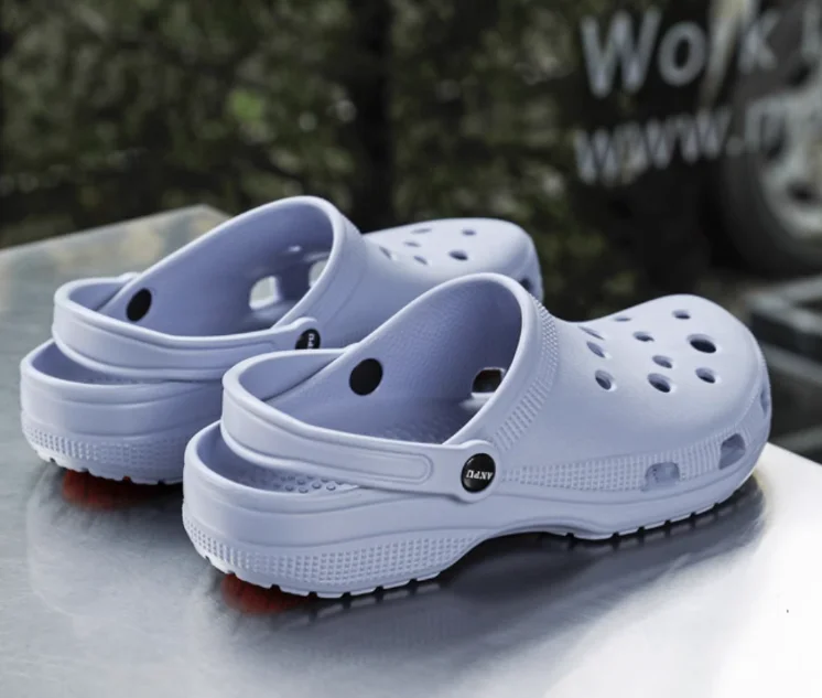 Crocs sandals women lightweight casual slip-on sandals for ladies in black comfortable everyday footwear from VelmoraMart