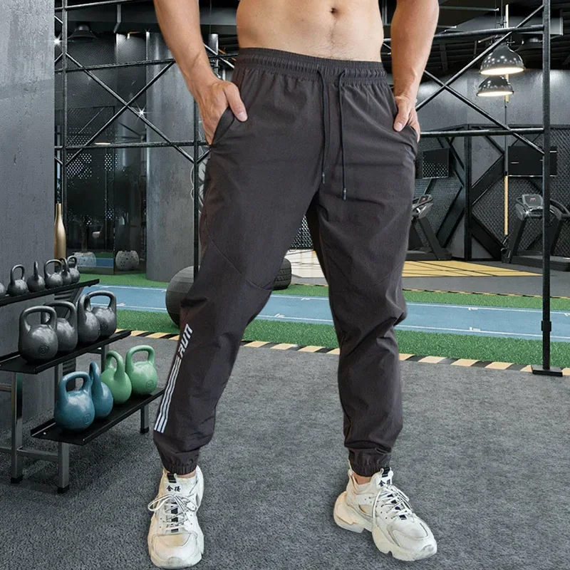 Men Gym Fitness Sports Running Trousers Outdoor Workout Jogging Sweatpants Dry Fit Leggings Zipper Pockets Long Pants sports sweatpants