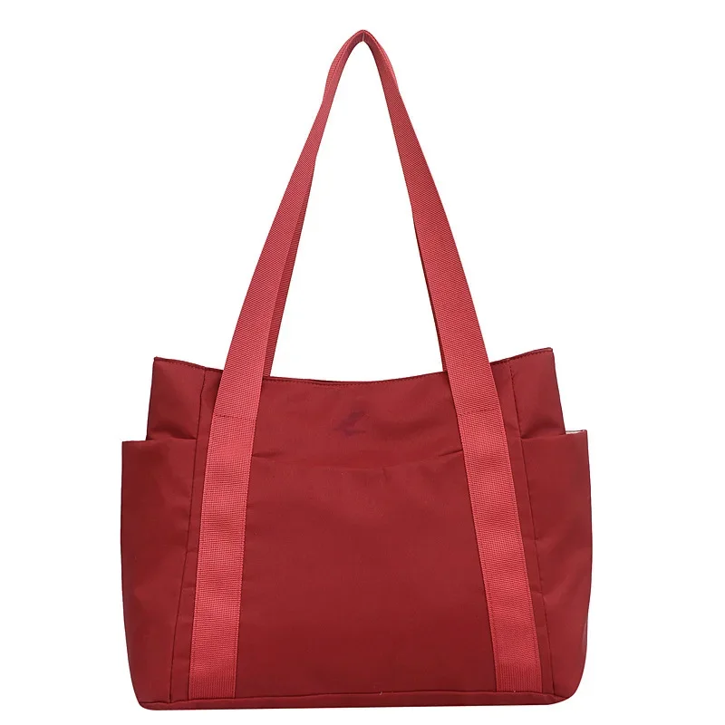 thumbnail image 1 of Nuevo bolso de mujer 2024, de color liso, para ir al trabajo, de hombro, sencillo, para mamás, para salir, de nailon, de gran capacidad, 1 of 5