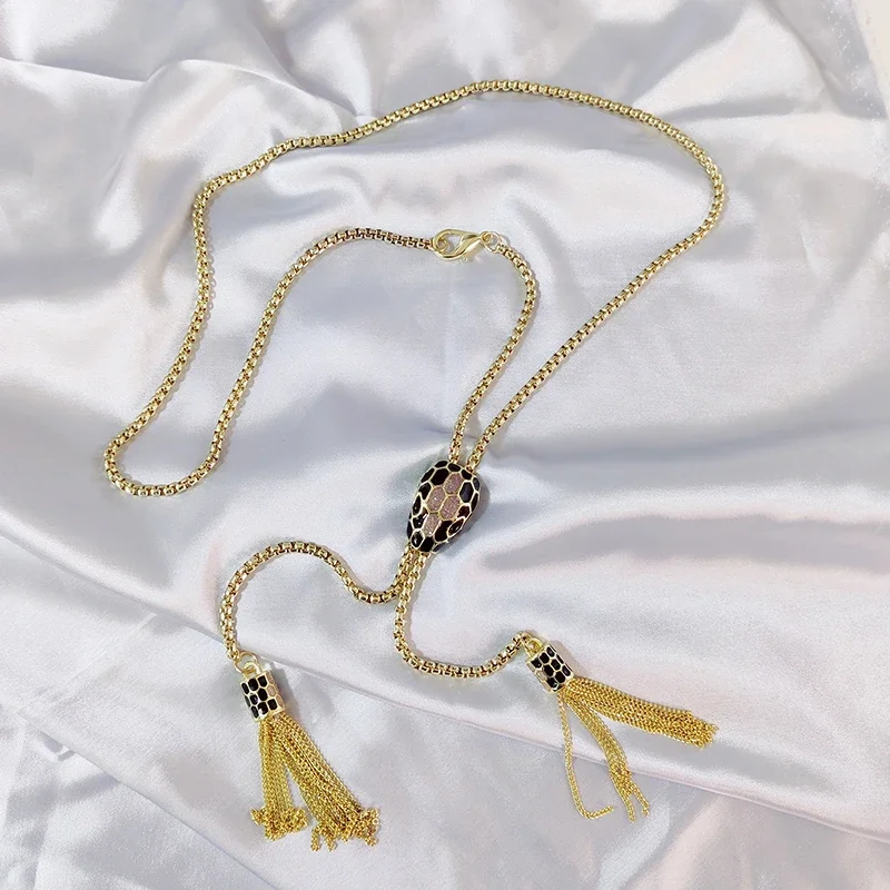 

High sense snake head waist chain accessories women's dress sweater fringe chain sexy metal belt