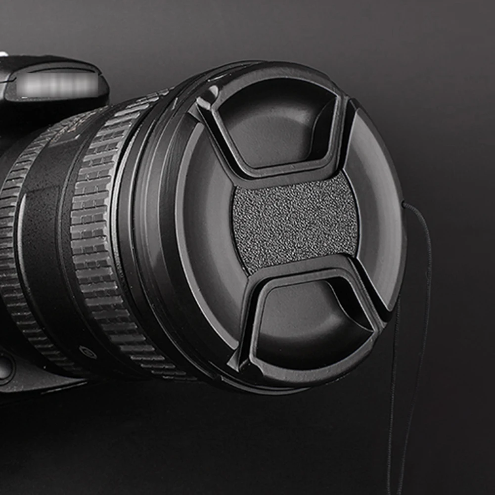 Description Picture 6 of item49mm 52mm 55mm 58mm 62mm 67mm 72mm 77mm Camera Lens Cap Snap-On Center-Pinch Lens Cover for Nikon Iconic Brand Iconic Brand DSLR Lens