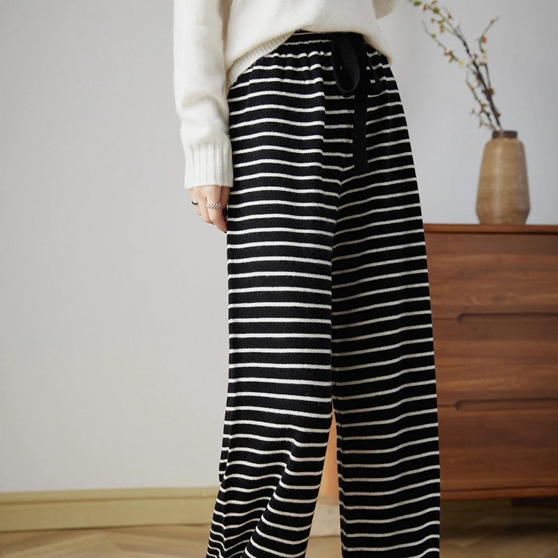 

In the early autumn of 2023, the new loose and slim wide-leg pants with high waist stripes and drooping casual mop pants.