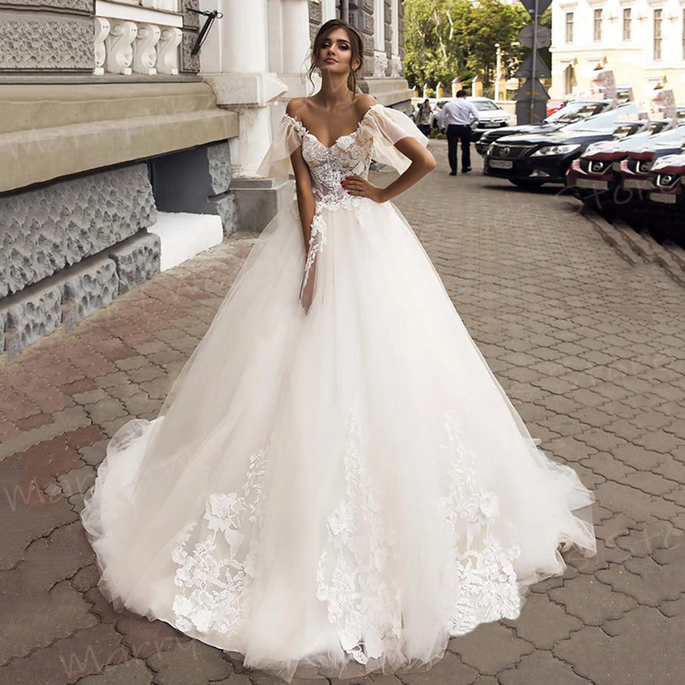 

Beautiful Charming A Line Women's Wedding Dresses New Appliques Lace Backless Bride Gowns Sexy Off The Shoulder Vestido De Novia