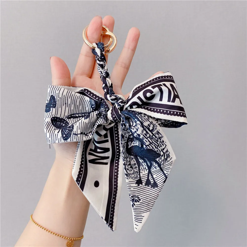 

New Hand-Woven Silk Scarf Bow Keychain Bowknot Key Holder Tassels Car Keychains Women Keyring Horseshoe Buckle Bag Charm Pendant