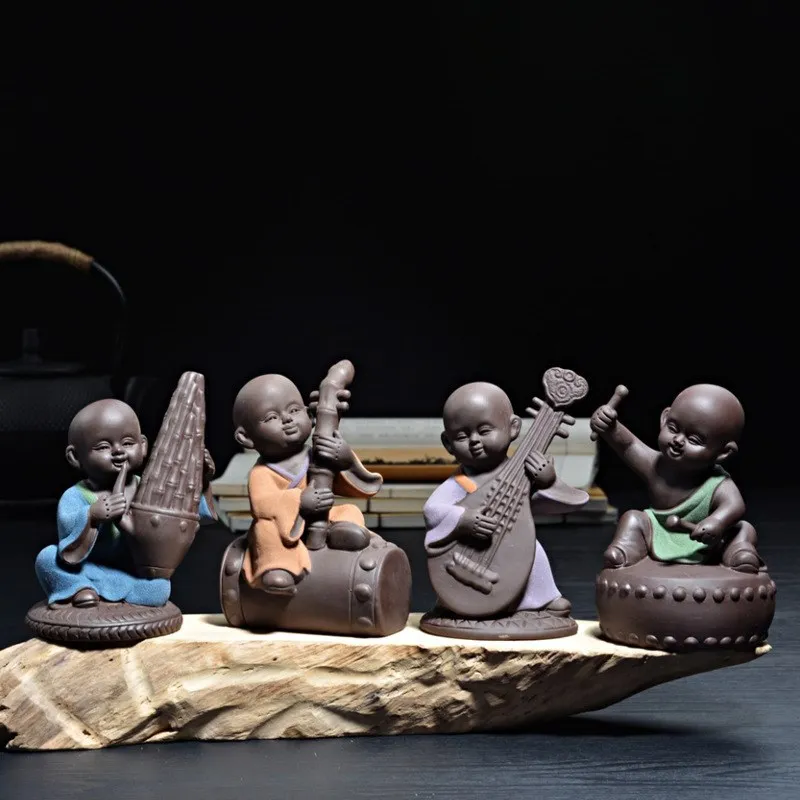 

Color Sand Pottery Purple Sand Fine Tea Pet Kung Fu Tea Art Small Ornaments Blowing Pull Playing and Singing Little Monk Tea Set