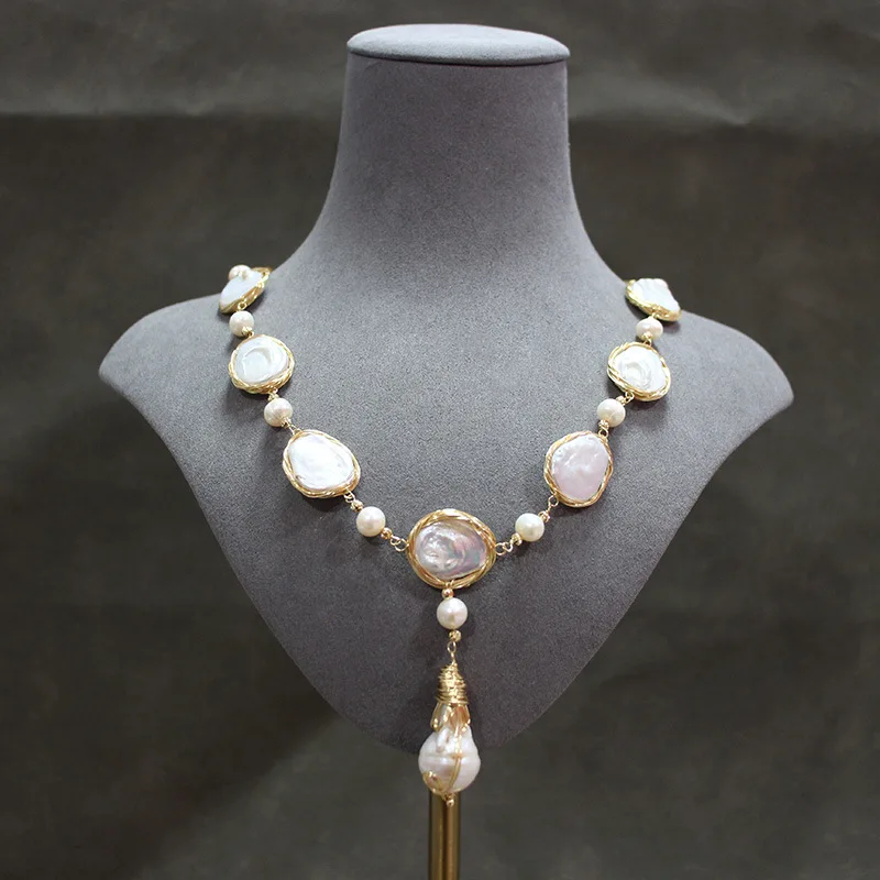 

Ожерелье и серьги из пресноводного жемчуга в стиле барокко