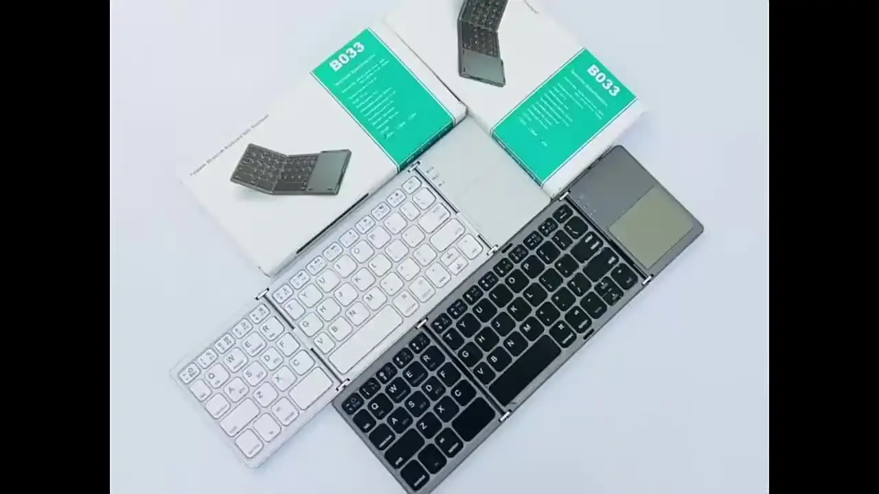 Bluetooth付き折りたたみ式ミニキーボード,タッチパッド付きの