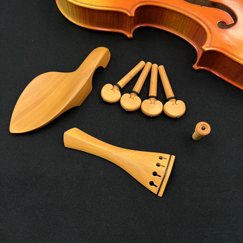 Description Picture 5 of item1 set High quality 4/4 violin viola Boxwood accessories parts fittings,Tailpiece+Tuning pegs+Endpins+Chin rest/Chin Holder