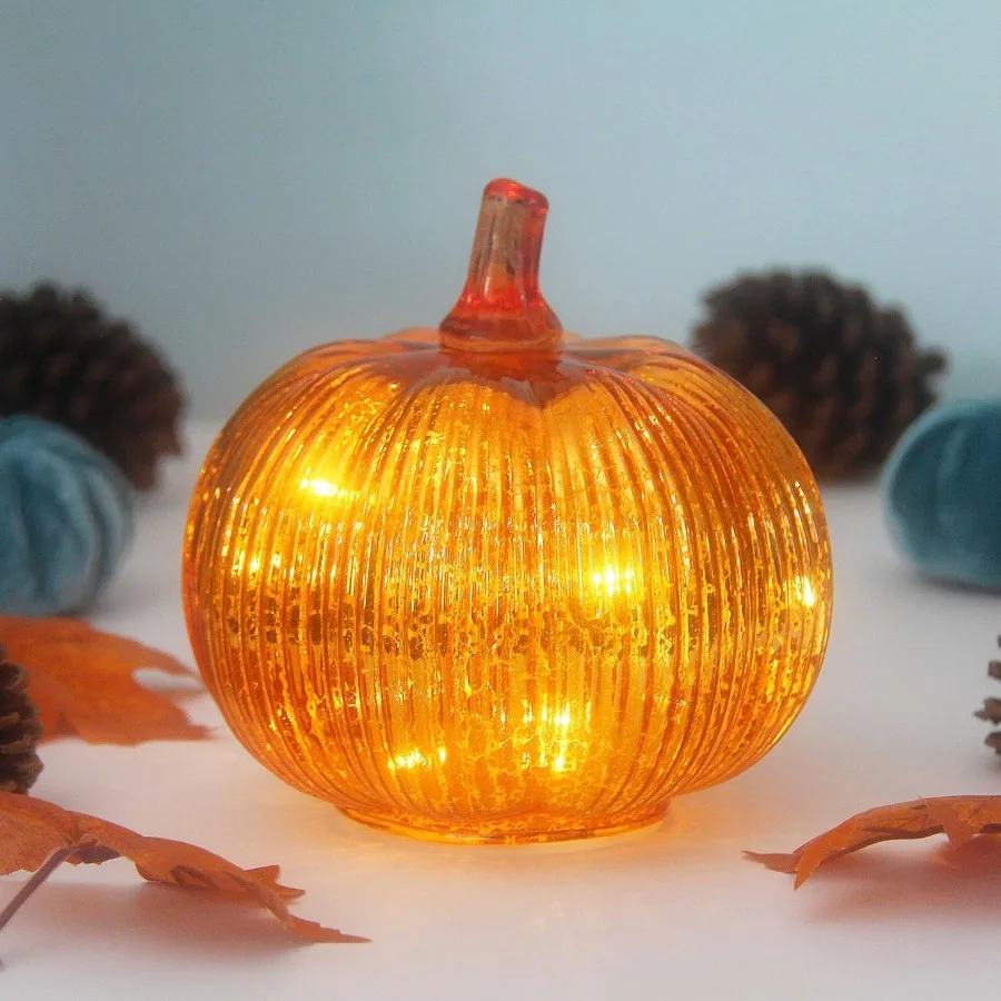 Batteryoperated mercury glass pumpkin lights with timer feature perfect for Halloween and fall decorations ideal for Thanksgivi