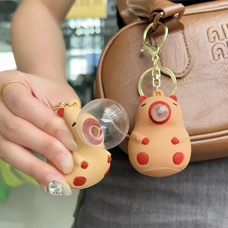 Capybara Doll Pinch Music Keychain Toys Squeeze Spit Bubble Decompression Toy Children's Schoolbag Doll Pendant Decoration