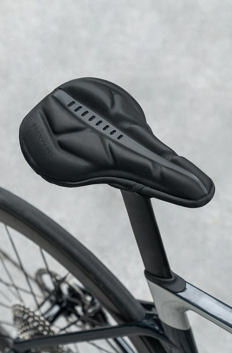 adattamento coprisella sulla bicicletta