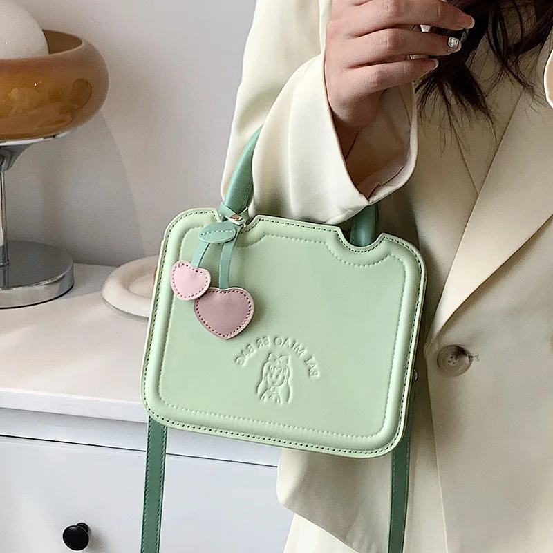 

Cute and stylish small bag for women's handheld crossbody foreign style biscuit bag niche high-end French style small square bag