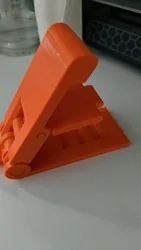 Compact Foldable Phone Stand with Adjustable Viewing Angles (Orange)