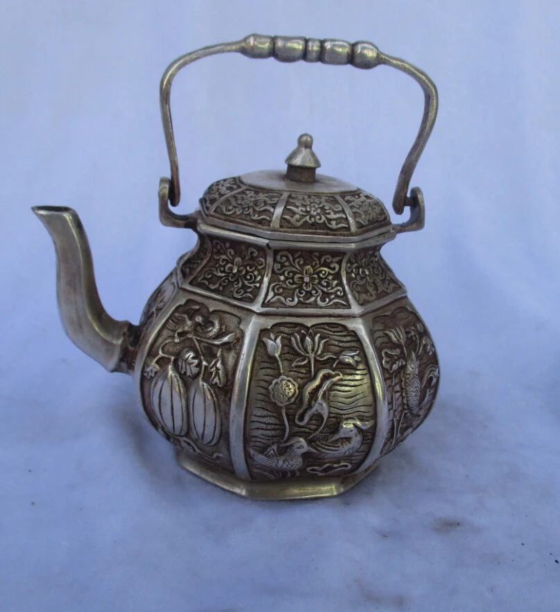 

Collectible Decorated Old Handwork Tibet Silver Carved Fish Flower Teapot/Flagon fast 000019