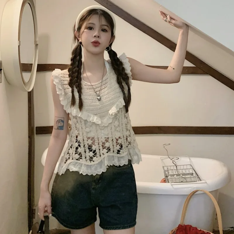 

New hollowed out hook flower small tank top with a female design feel, niche vacation, loose fitting, age reducing, thin top tre