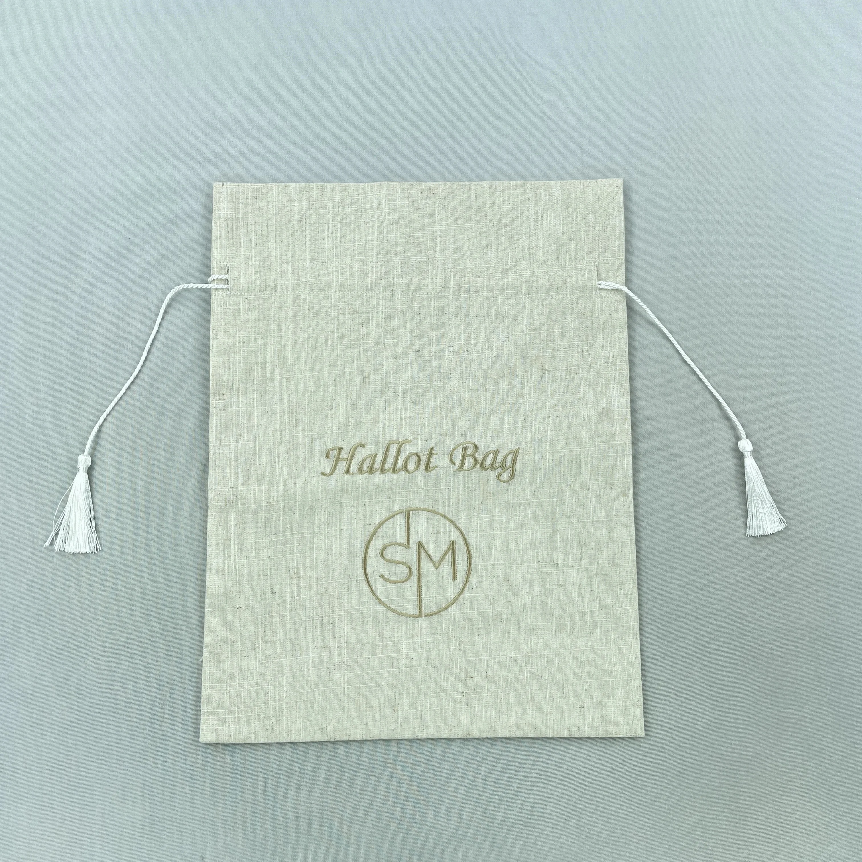 Cutomized hallot bags with beige embroidery and ivory fringes