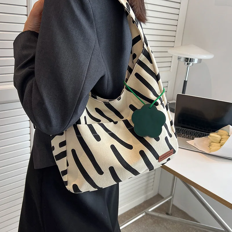 

Zebra Patterned Canvas Bag for Women's New Trendy and Fashionable Contrasting Color Tote Bag Versatile and Large Capacity