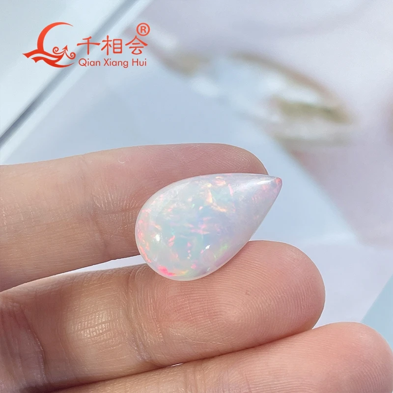 4-7ct pear-shaped natural white opal cabochon, colorful, certified, perfect for unique jewelry designs.