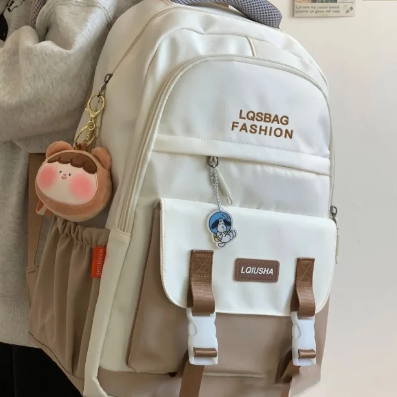 The new college style soft girl color schoolbag Korean version simple letter backpack for primary and secondary school students