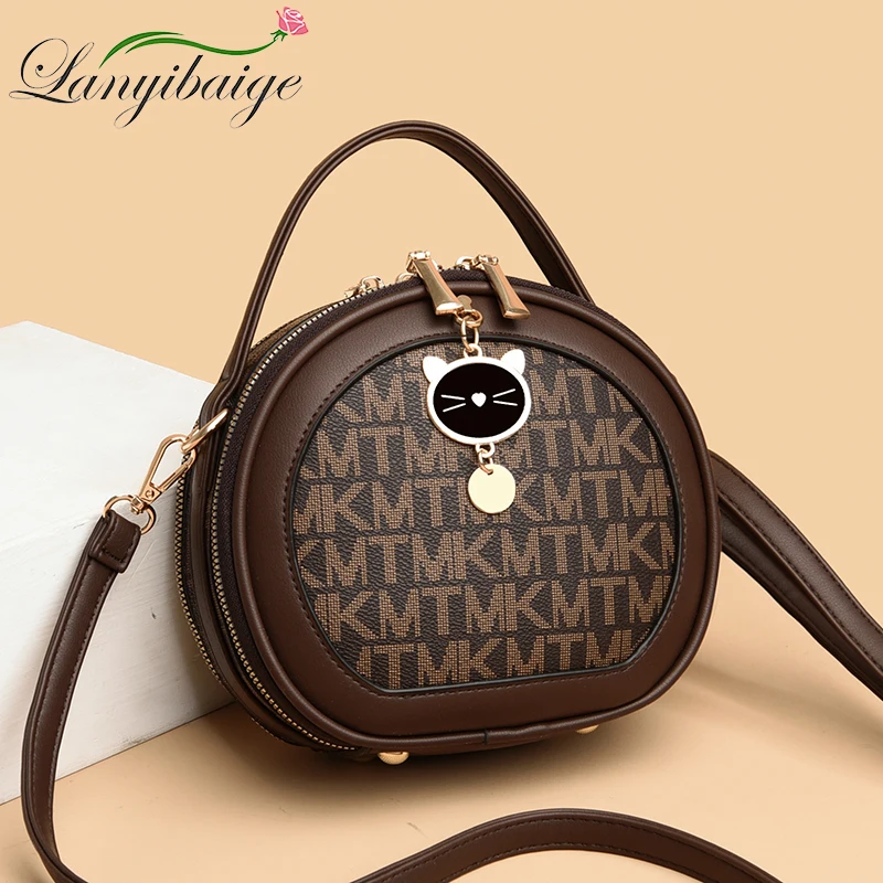 mk round sling bag
