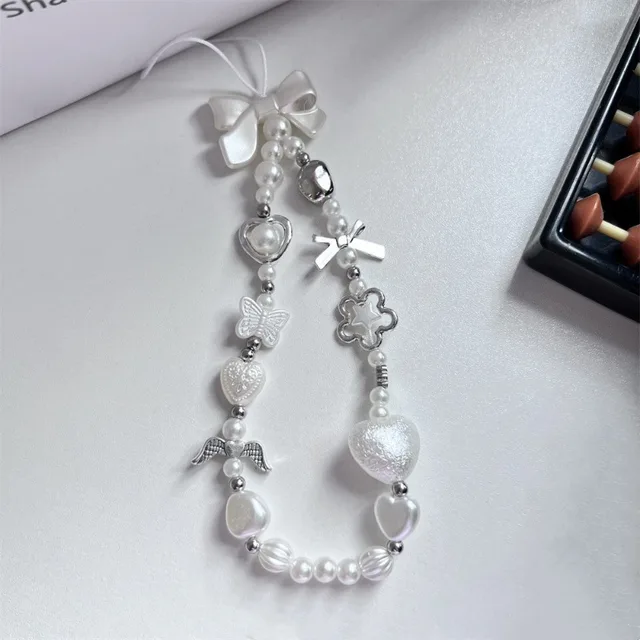 Lanière à breloques en chaîne de téléphone perlée pour iPhone Samsung, joli nœud blanc baroque, breloque en forme de fleur, accessoires universels, pendentif de bijoux 1