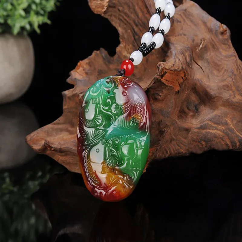 

Natural Xinjiang Gobi Gold Silk Jade Colorful Jade Floating Flower Three Fish Ruyi Pendant Has More Than Pendant Every Year